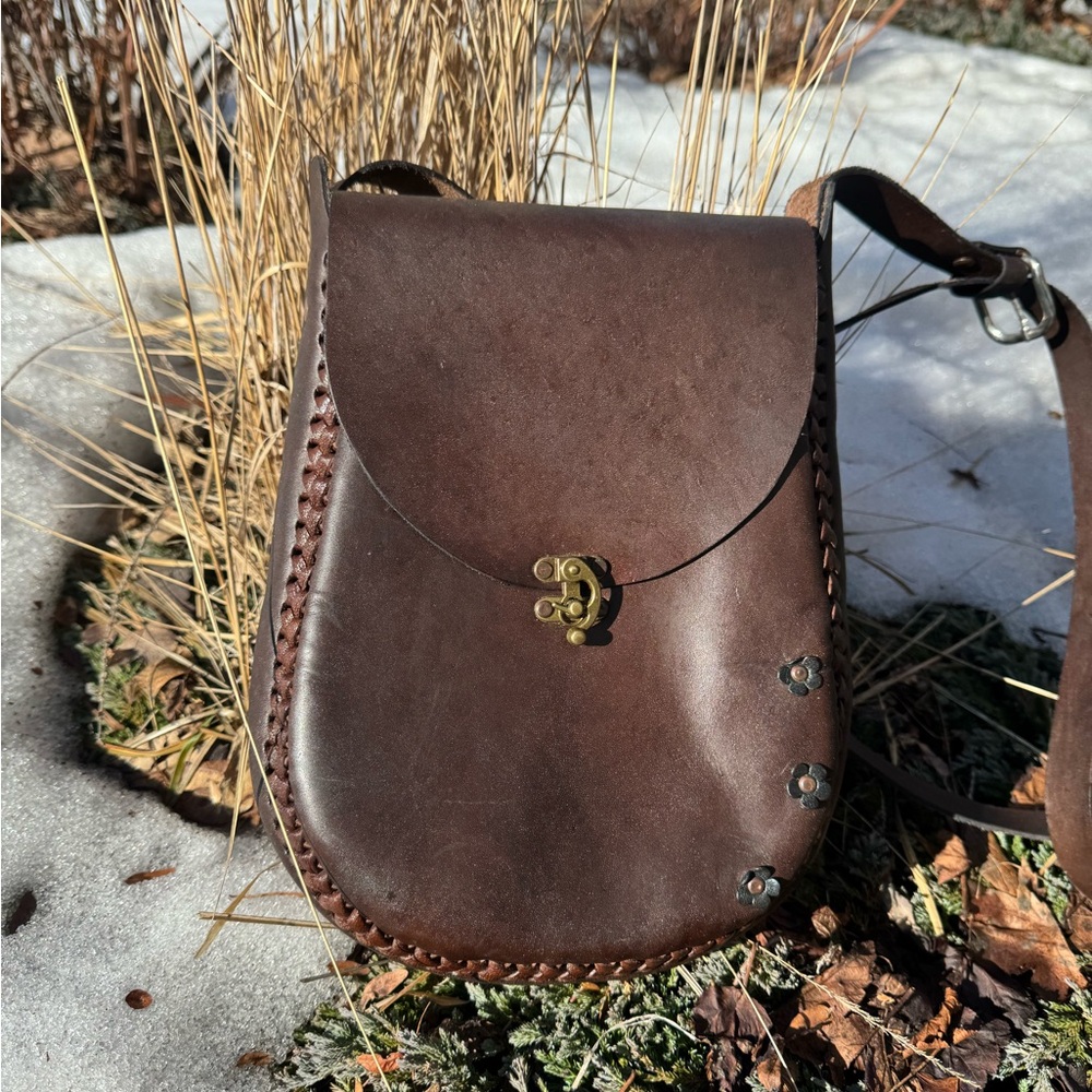 Handcrafted Dark Brown Leather Crossbody Bag with Floral Rivet Accents